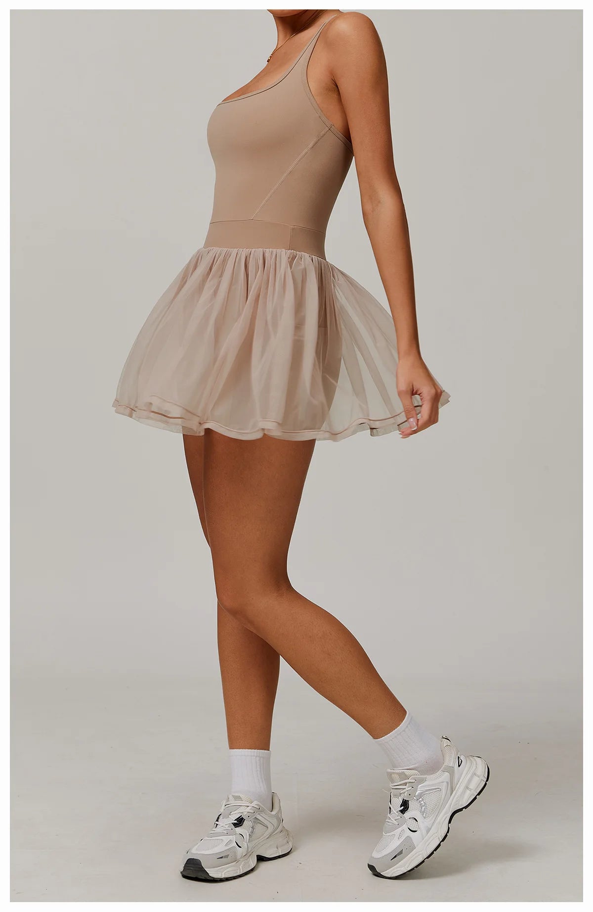 Active dress with sleeveless bodice and flared transparent tulle skirt, tan