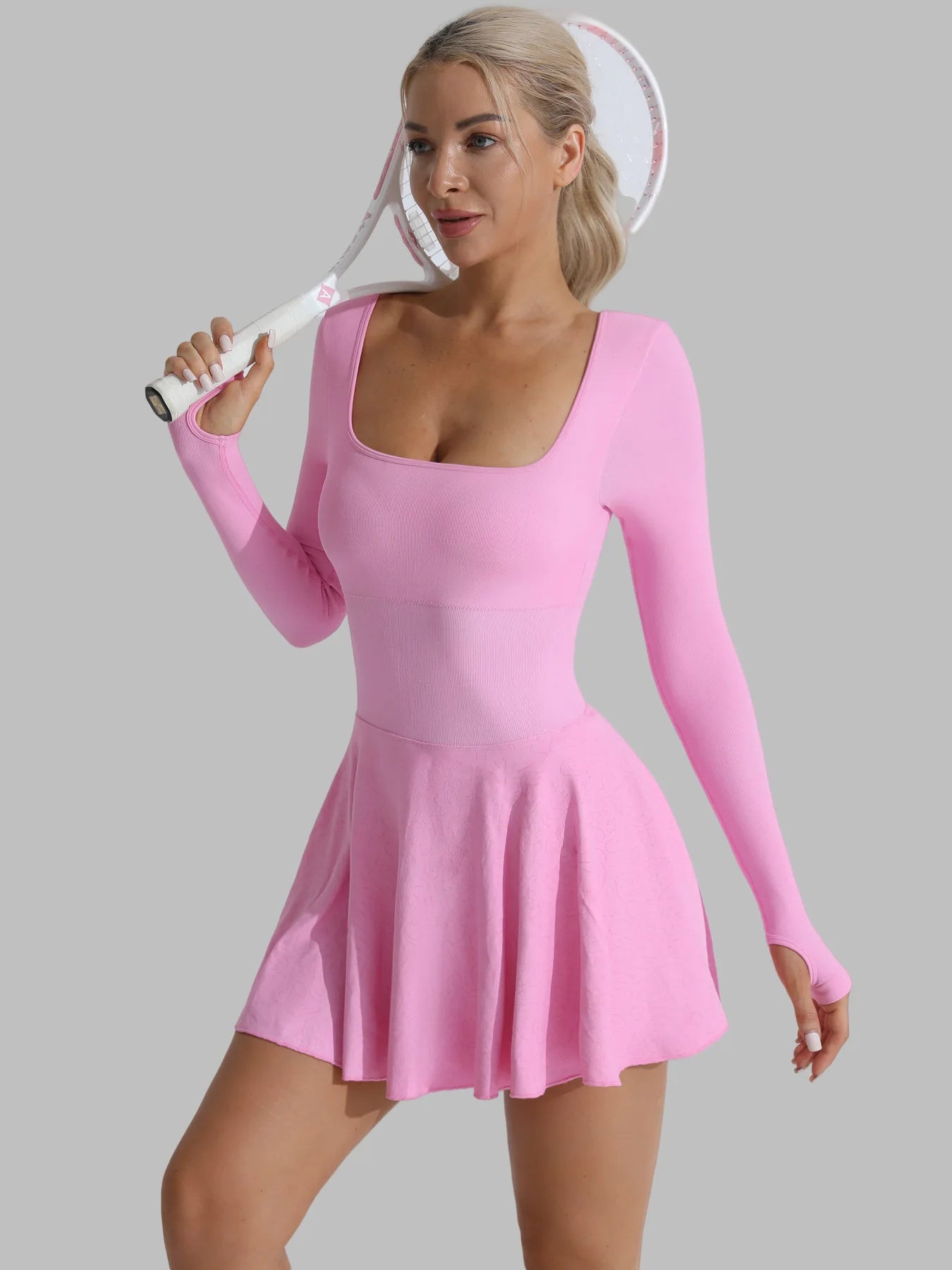 Light purple long-sleeve active dress with scoop neckline, skater skirt and built-in shorts.