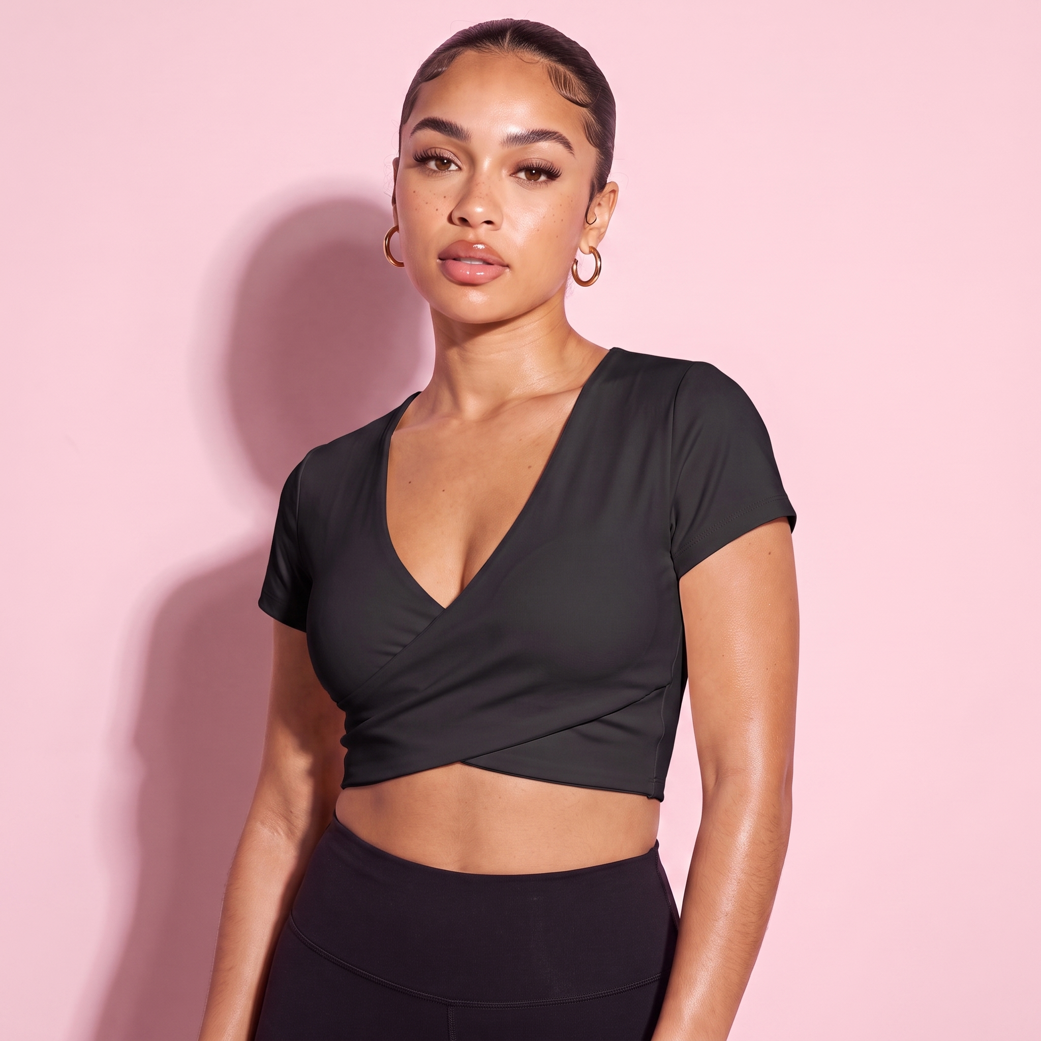 Cross-over crop top, black V-neck short sleeves, wrap front hem