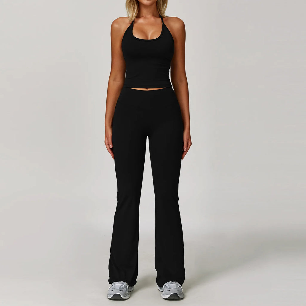 Xooie Fit Two-Piece Set featuring halter tank high-waisted flared pants activewear in sleek black