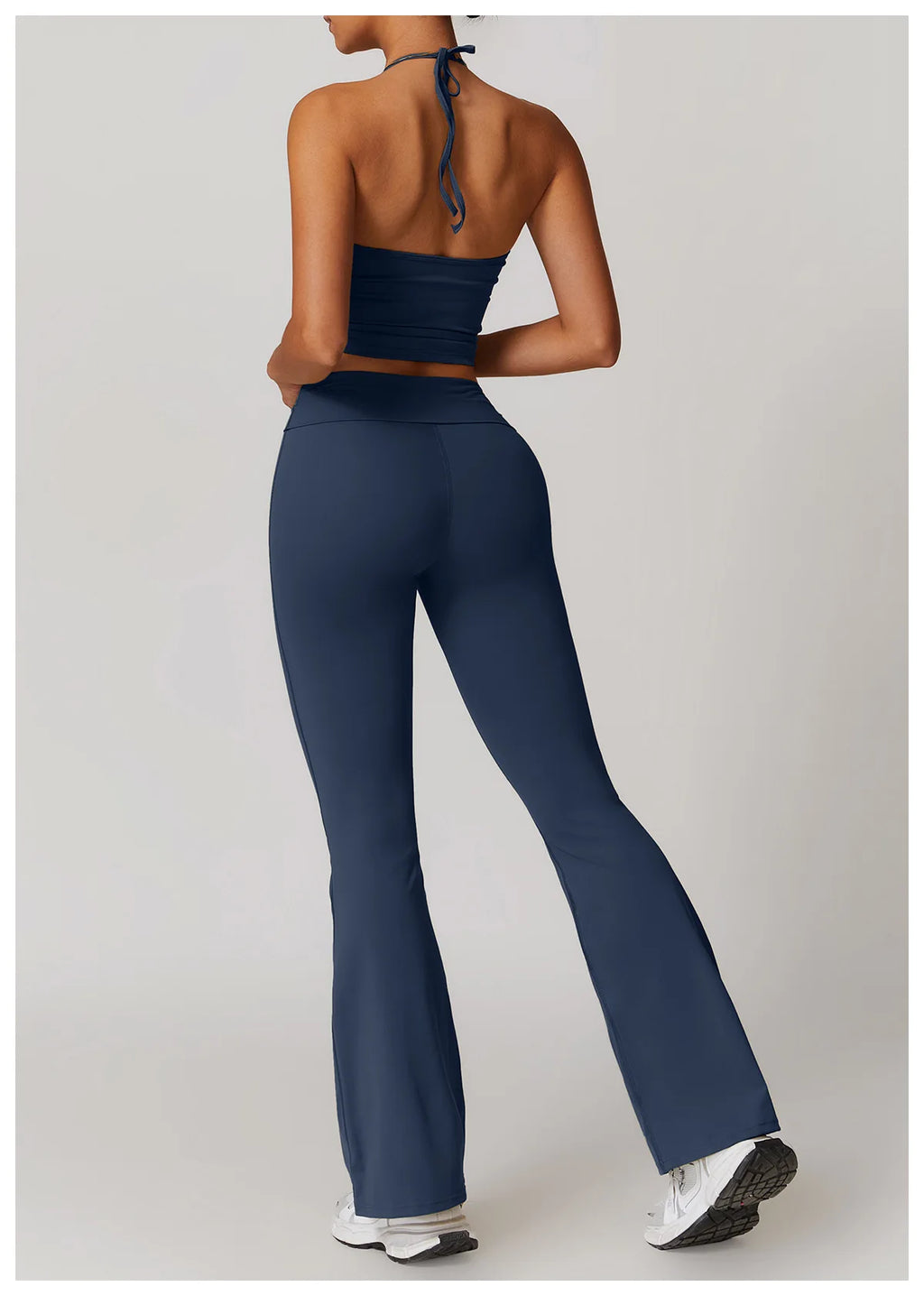 Xooie Fit Two-Piece Set featuring a halter tank and high-waisted flared pants activewear in blue