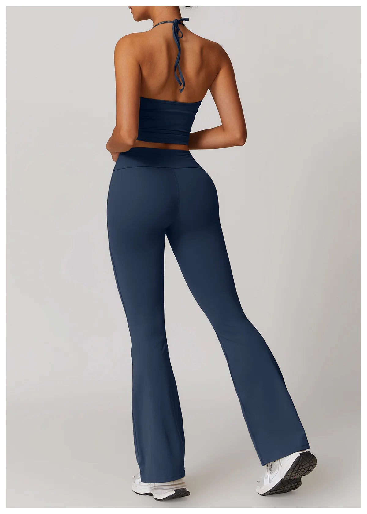 Xooie Fit Two-Piece Set featuring a halter tank and high-waisted flared pants activewear in blue