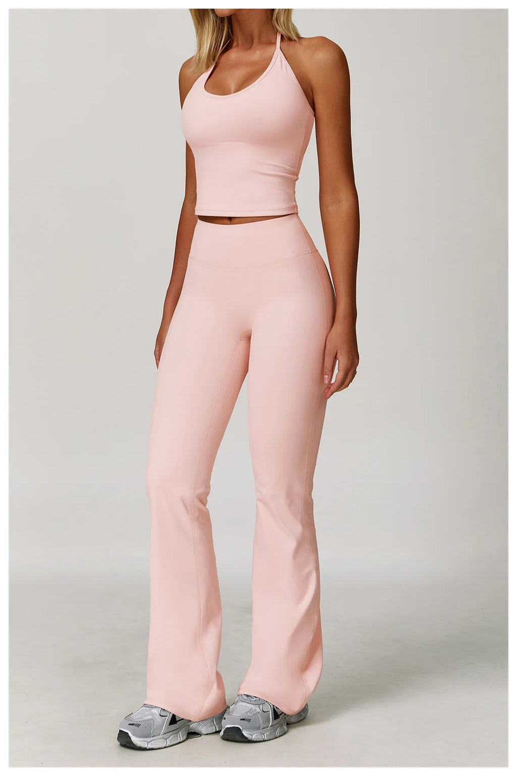 Xooie Fit Halter Tank High-Waisted Flared Pants Activewear Set in Soft Pink for Comfortable Workouts