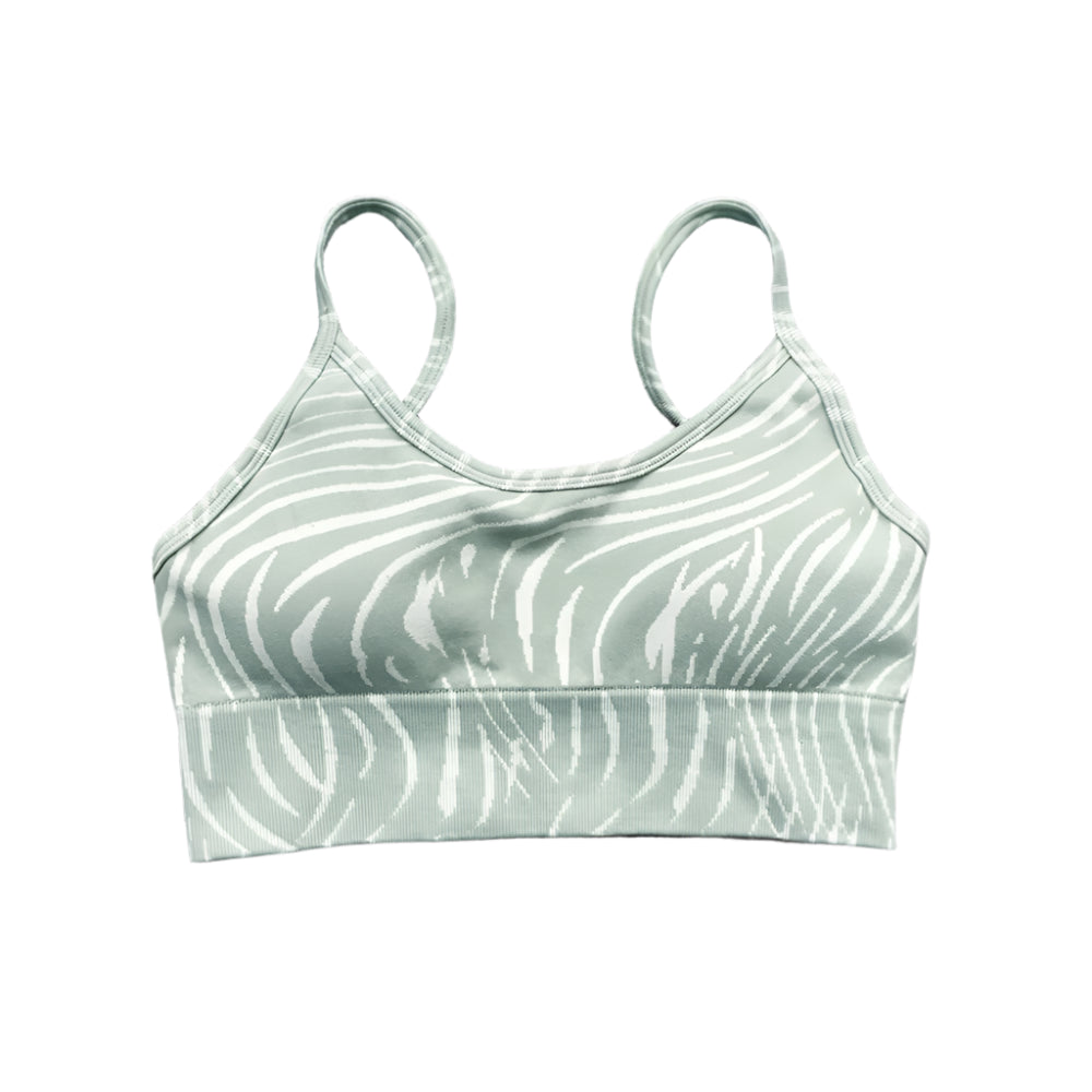Xooie Fit high-performance activewear bra in a green zebra print design for comfortable workout support