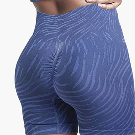 Xooie Fit high-performance activewear bra and shorts set in blue with wave pattern for optimal comfort and support