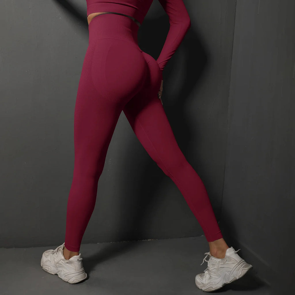 High-waist yoga leggings in dark rose red, full-length with fitted straight legs