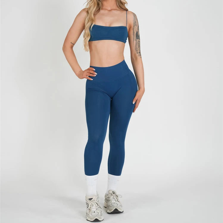 Xooie Fit women's 3 piece activewear set in blue, featuring a crop top and high-waisted leggings