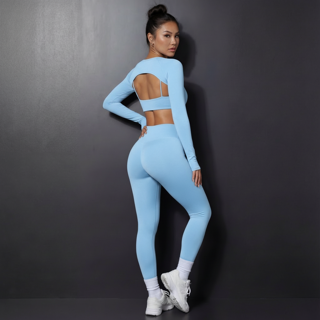 Xooie Fit women's 3 piece activewear set in light blue with stylish cutout details and fitted leggings
