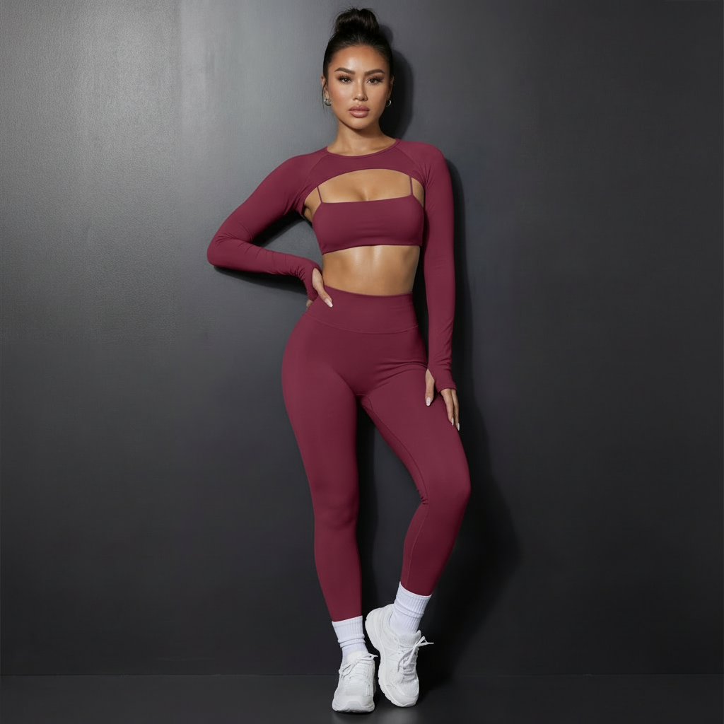 Xooie Fit women's 3 piece activewear set in burgundy featuring a long sleeve top, crop top, and high-waisted leggings