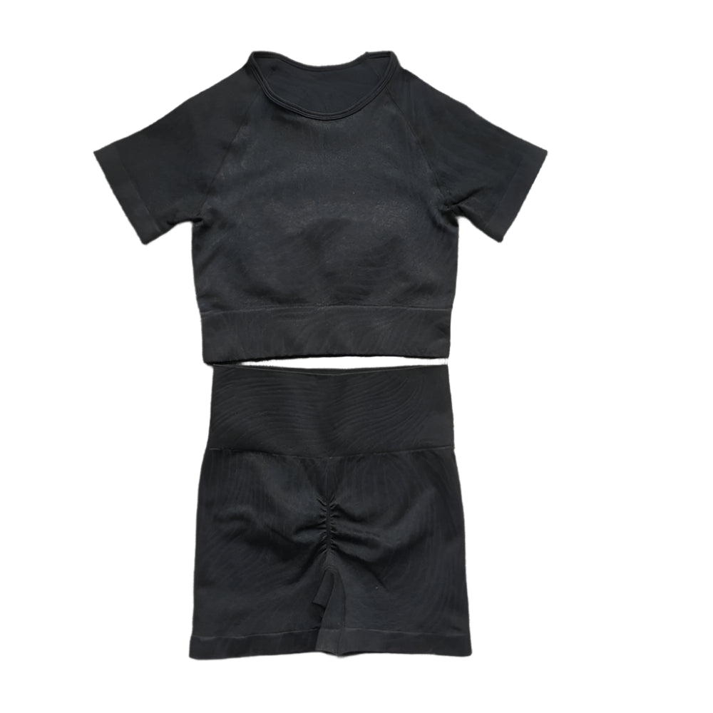 Xooie Fit women's fitted activewear set in black featuring a cropped top and matching shorts