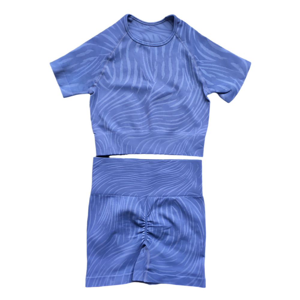 Xooie Fit women's fitted activewear set with a stylish crop top and matching shorts in blue