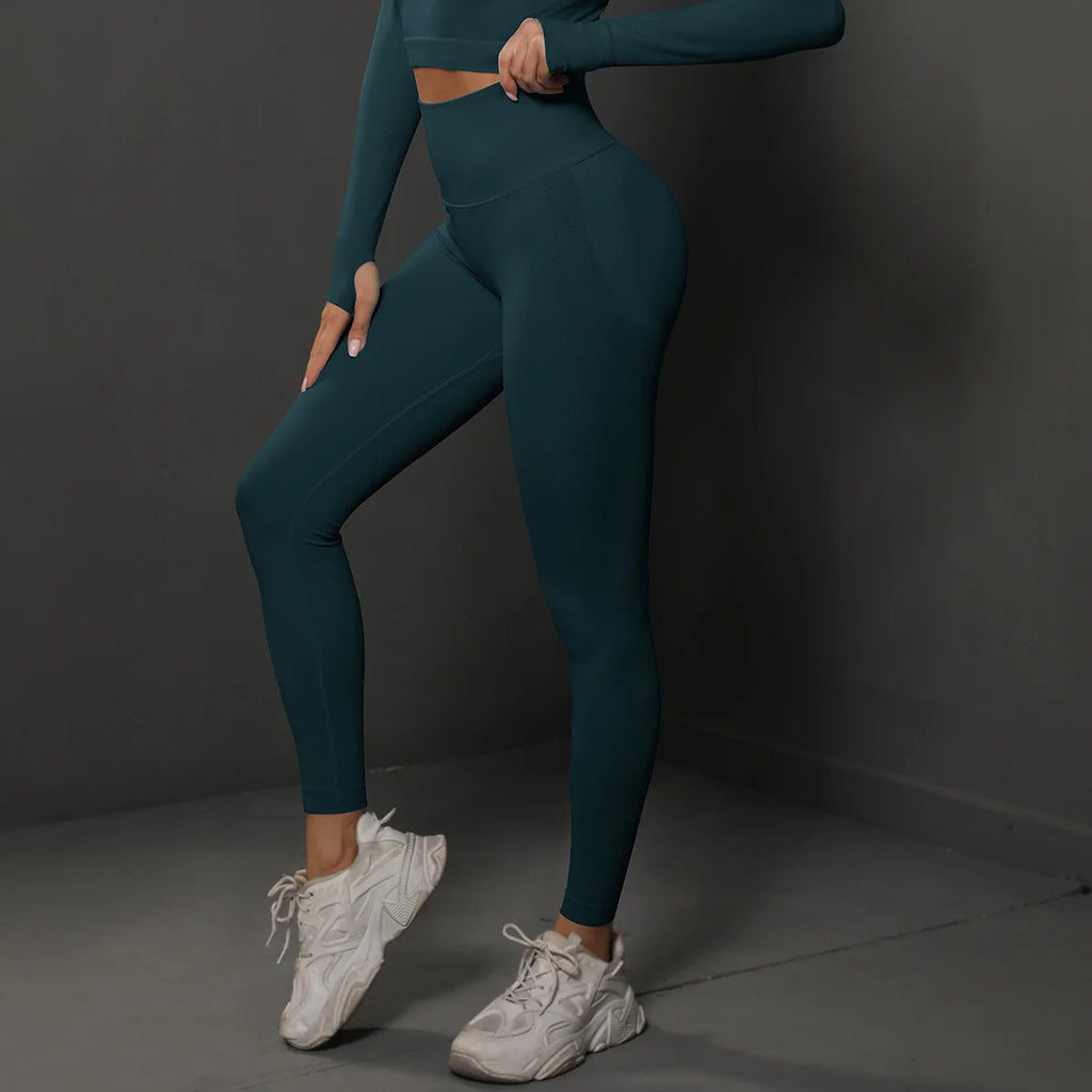 High-waist yoga leggings, dark teal, side view with fitted ankle length