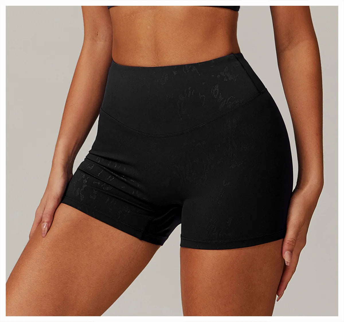 Xooie Fit black animal print active shorts with high waist and snug fit for workouts2