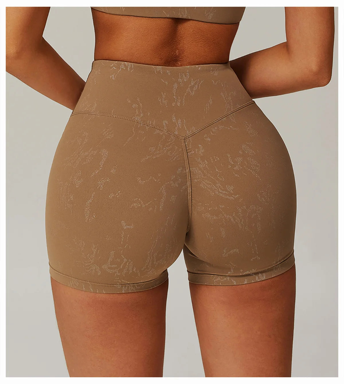 Xooie Fit brown animal print active shorts with high waist and slim fit design