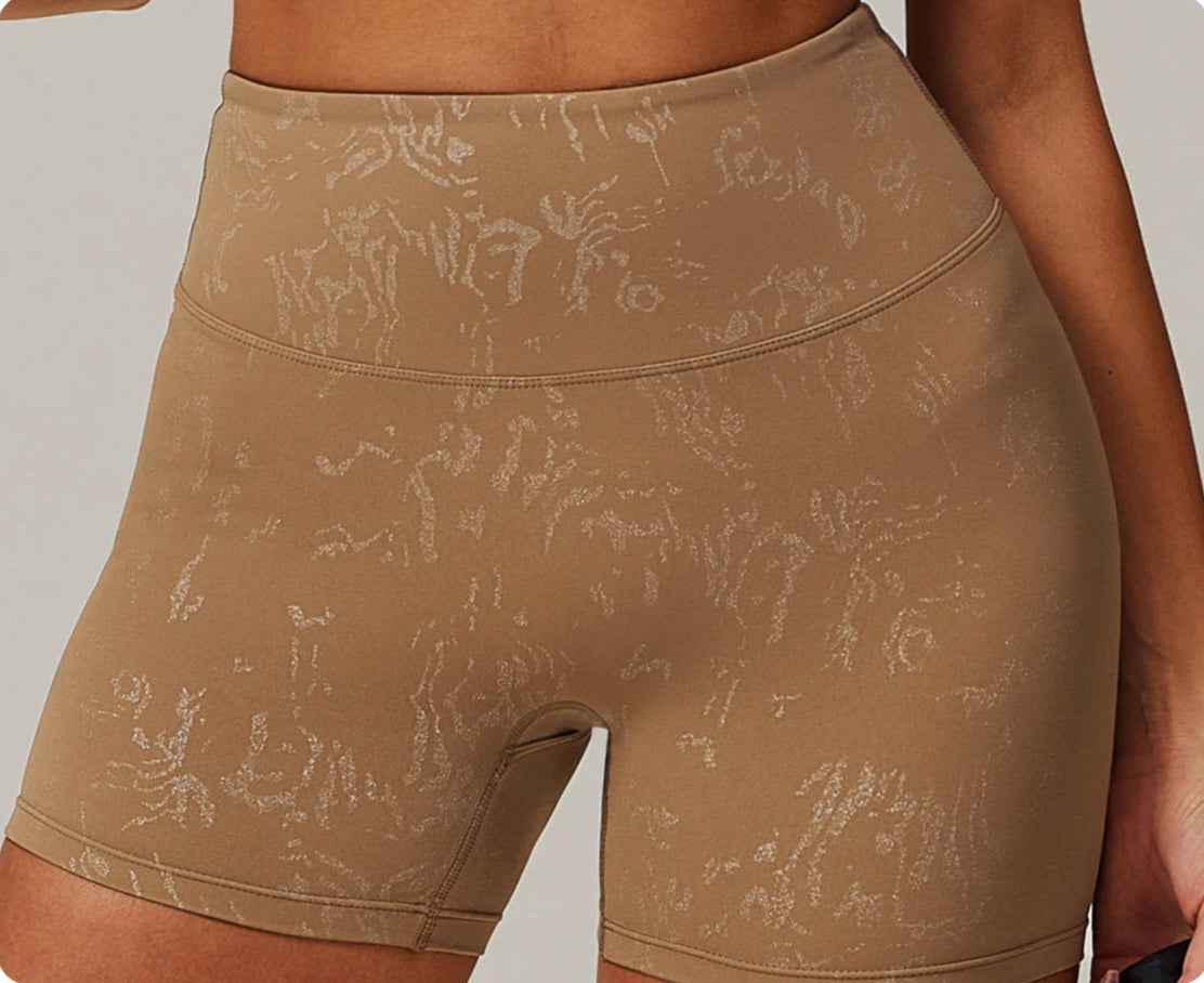 Xooie Fit animal print active shorts in tan with subtle pattern and high waistband