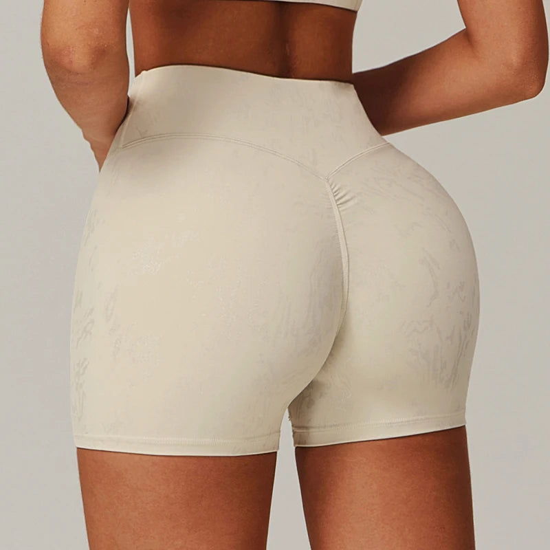 Xooie Fit beige animal print active shorts with high waist and ruched back design