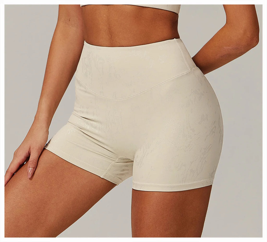 Xooie Fit beige animal print active shorts with high waist and snug fit for women