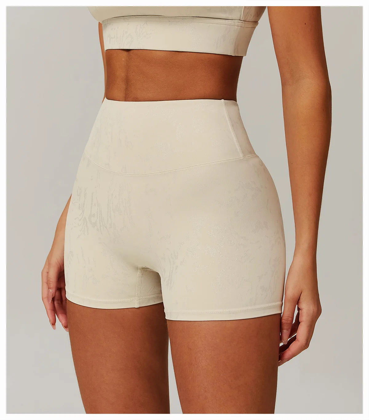 Xooie Fit animal print active shorts in beige with high waist and subtle pattern detail