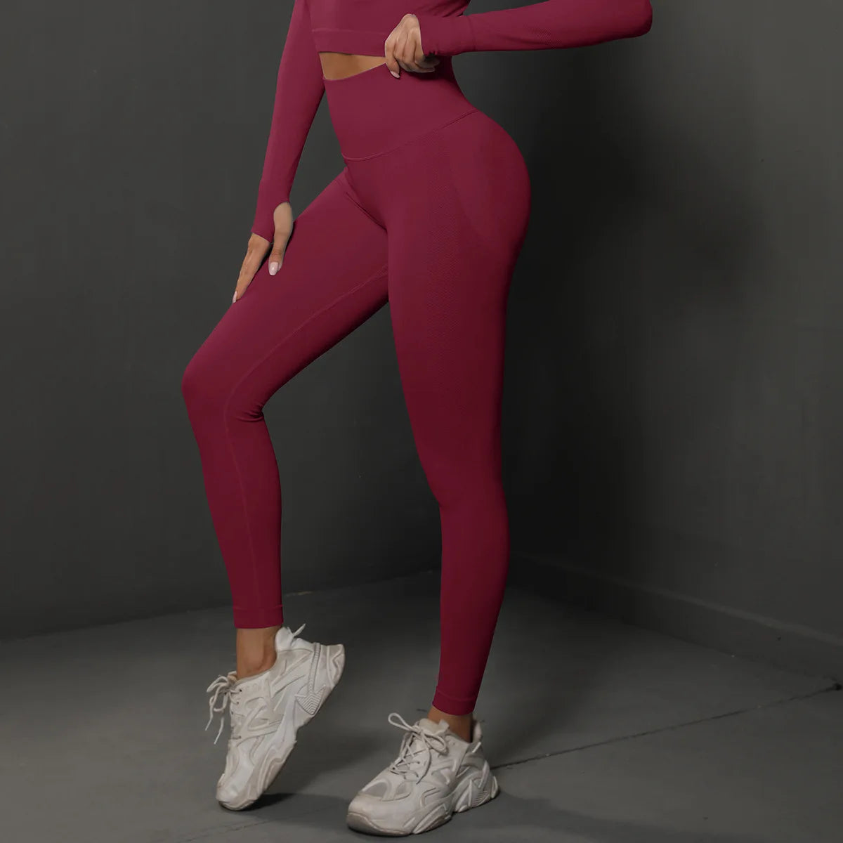 High-waist yoga leggings, deep wine red, front view with fitted ankle cuffs