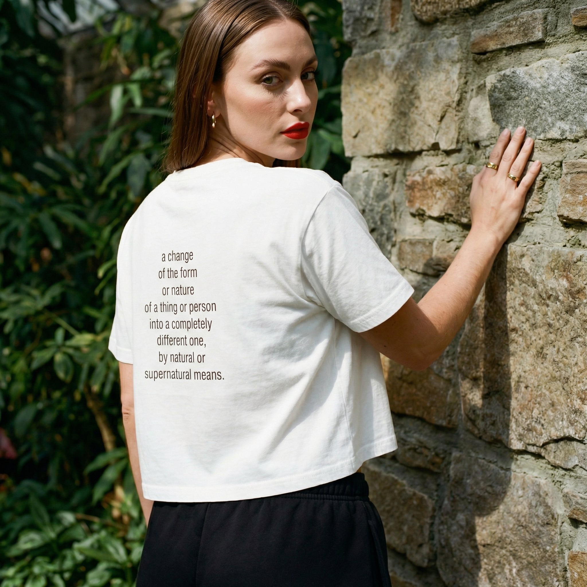 White crop T-shirt back quote: 'a change of the form or nature'