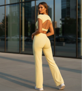 Sun Yellow backless crop top and high-waisted flare pants matching set