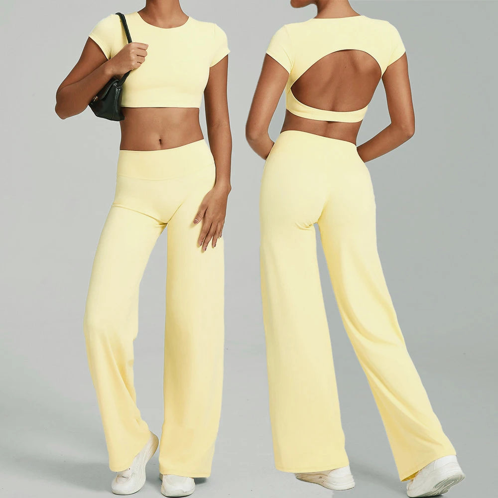 Xooie Fit backless crop top and flare pants set in yellow for a trendy and stylish look