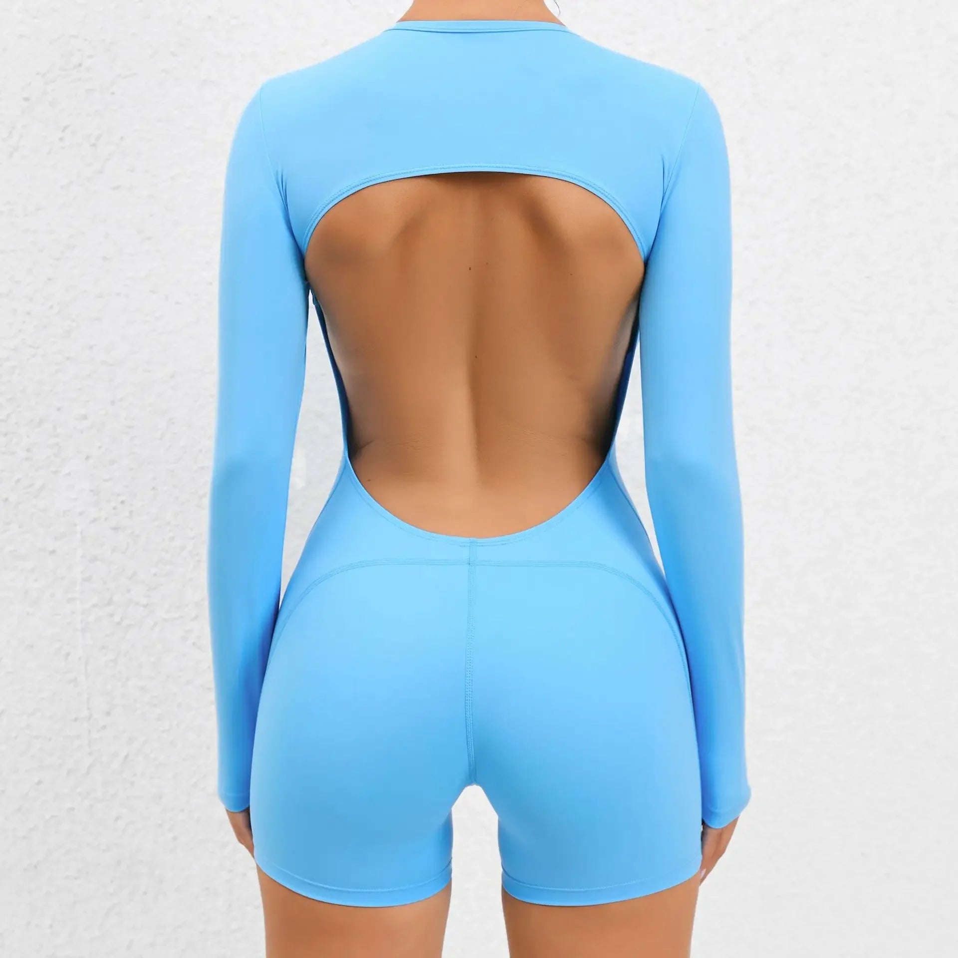 Xooie Fit Backless Romper for Women in Light Blue with Long Sleeves and Open Back Design