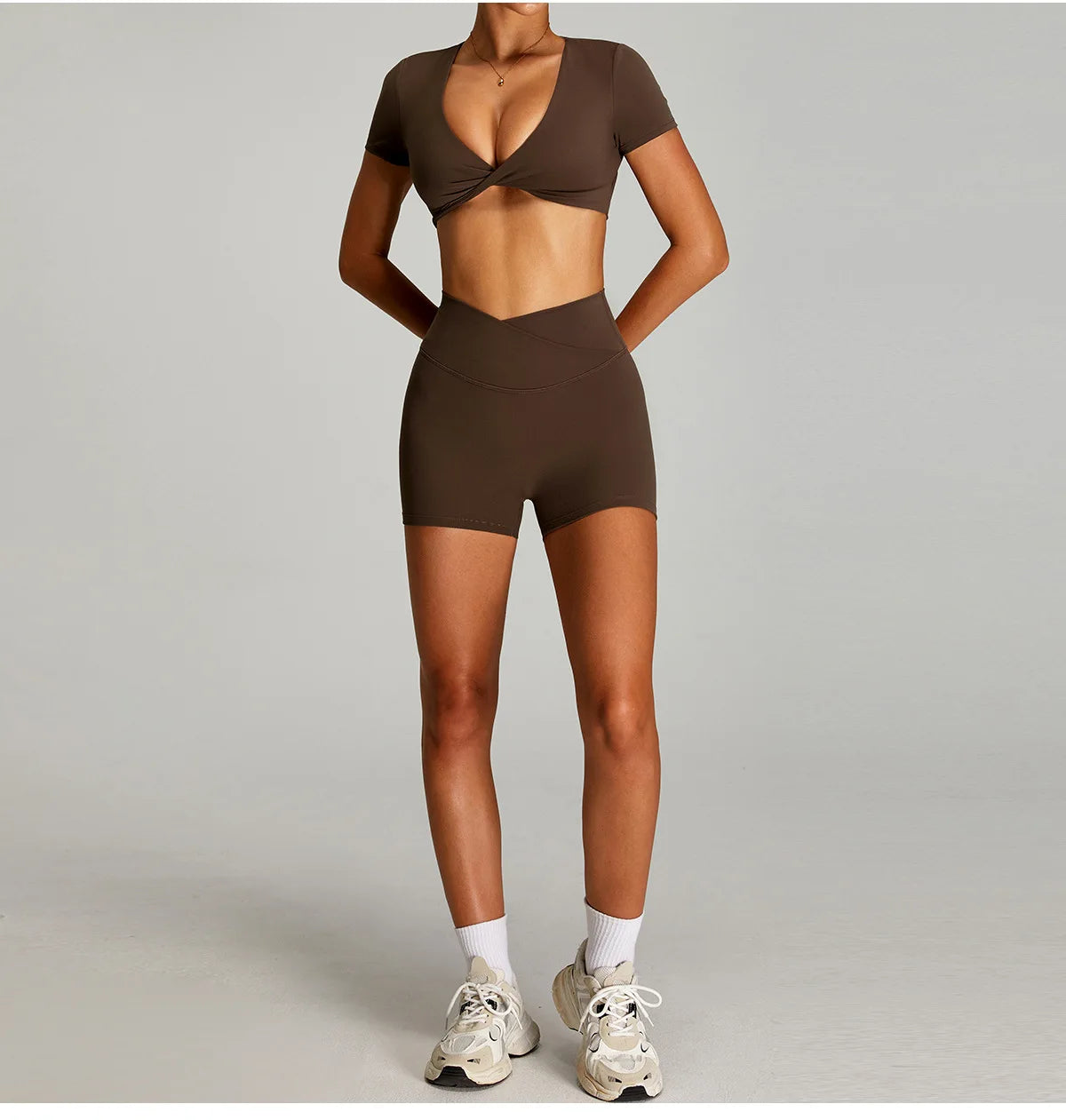 Xooie Fit backless twist crop top set in brown with a fitted design for stylish workouts