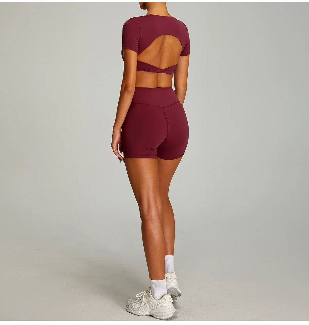 Xooie Fit Backless Twist Crop Top Set in Burgundy with Short Shorts and Cutout Design