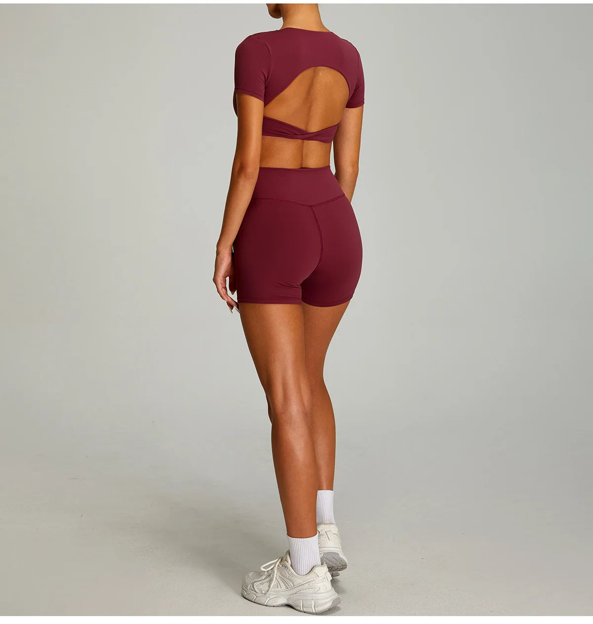 Xooie Fit Backless Twist Crop Top Set in Burgundy with Short Shorts and Cutout Design