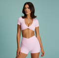 Pink backless twist crop top and matching shorts set