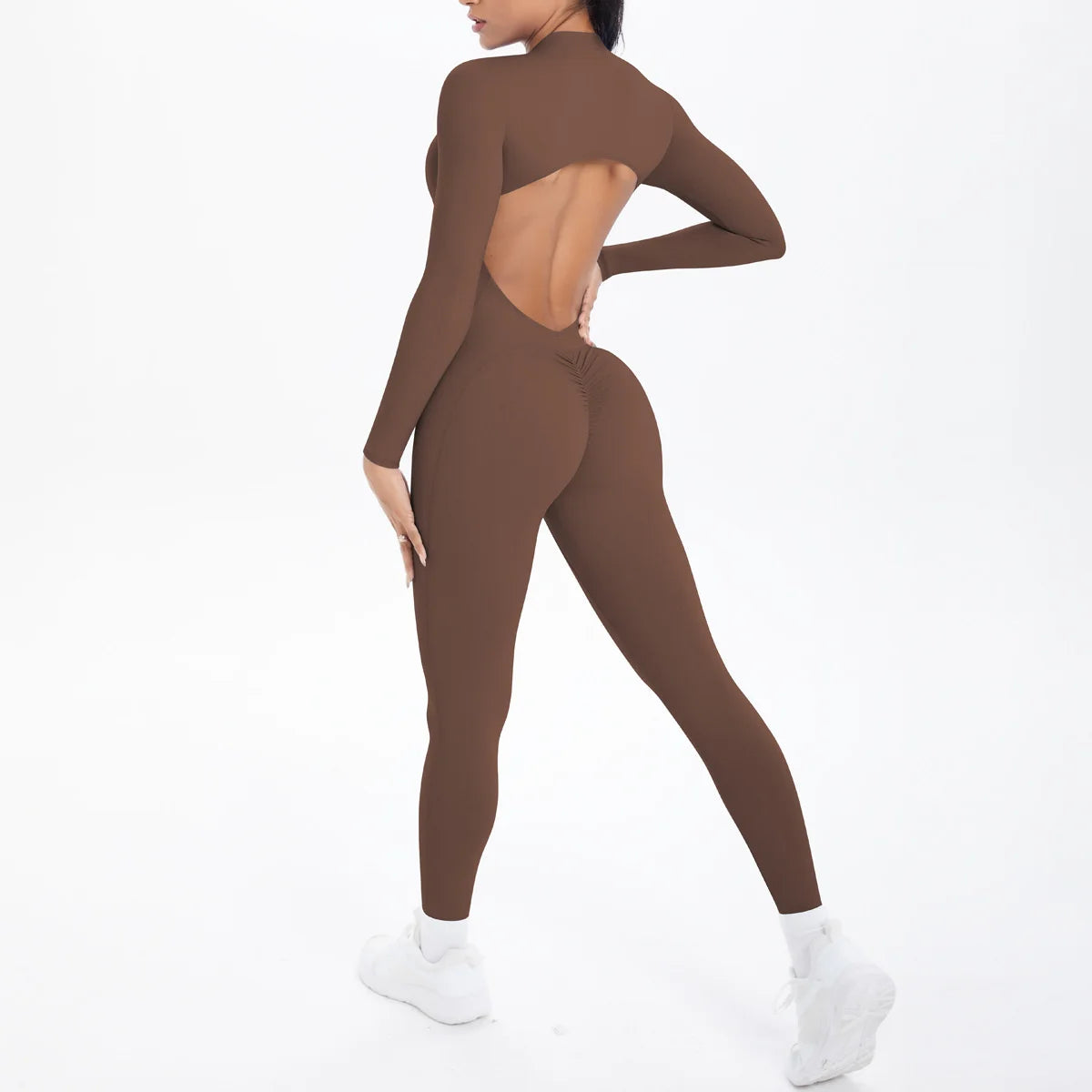 Stylish backless workout jumpsuit for women in brown, designed for comfort and performance
