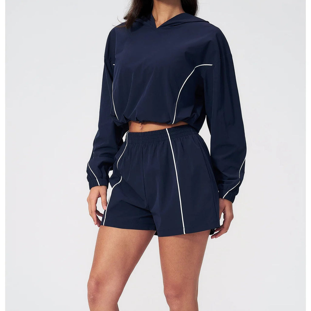 Navy hooded pullover and matching shorts set with side piping, elastic waistband