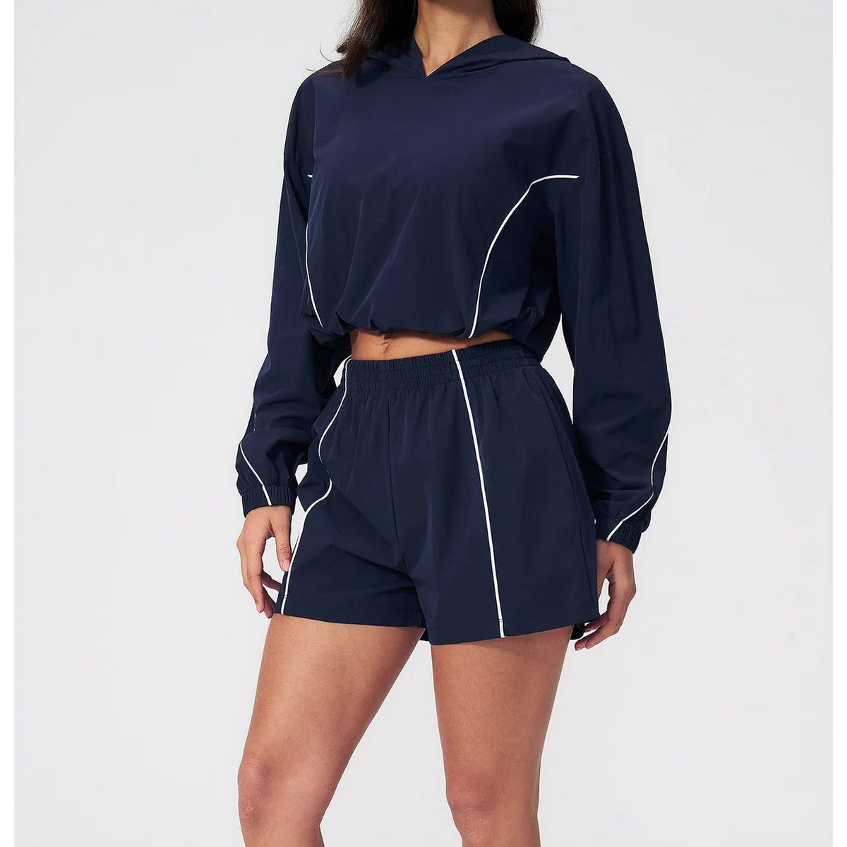 Navy hooded pullover and matching shorts set with side piping, elastic waistband