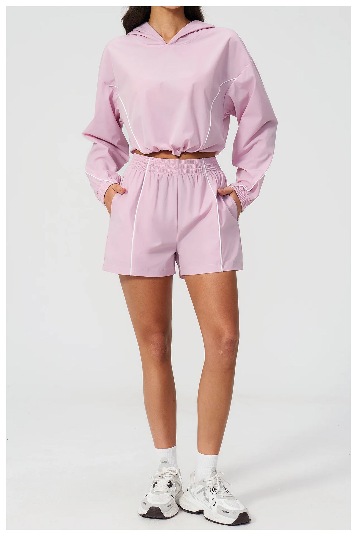 Pink hooded pullover and matching shorts set, long sleeves, elastic waist and drawcord
