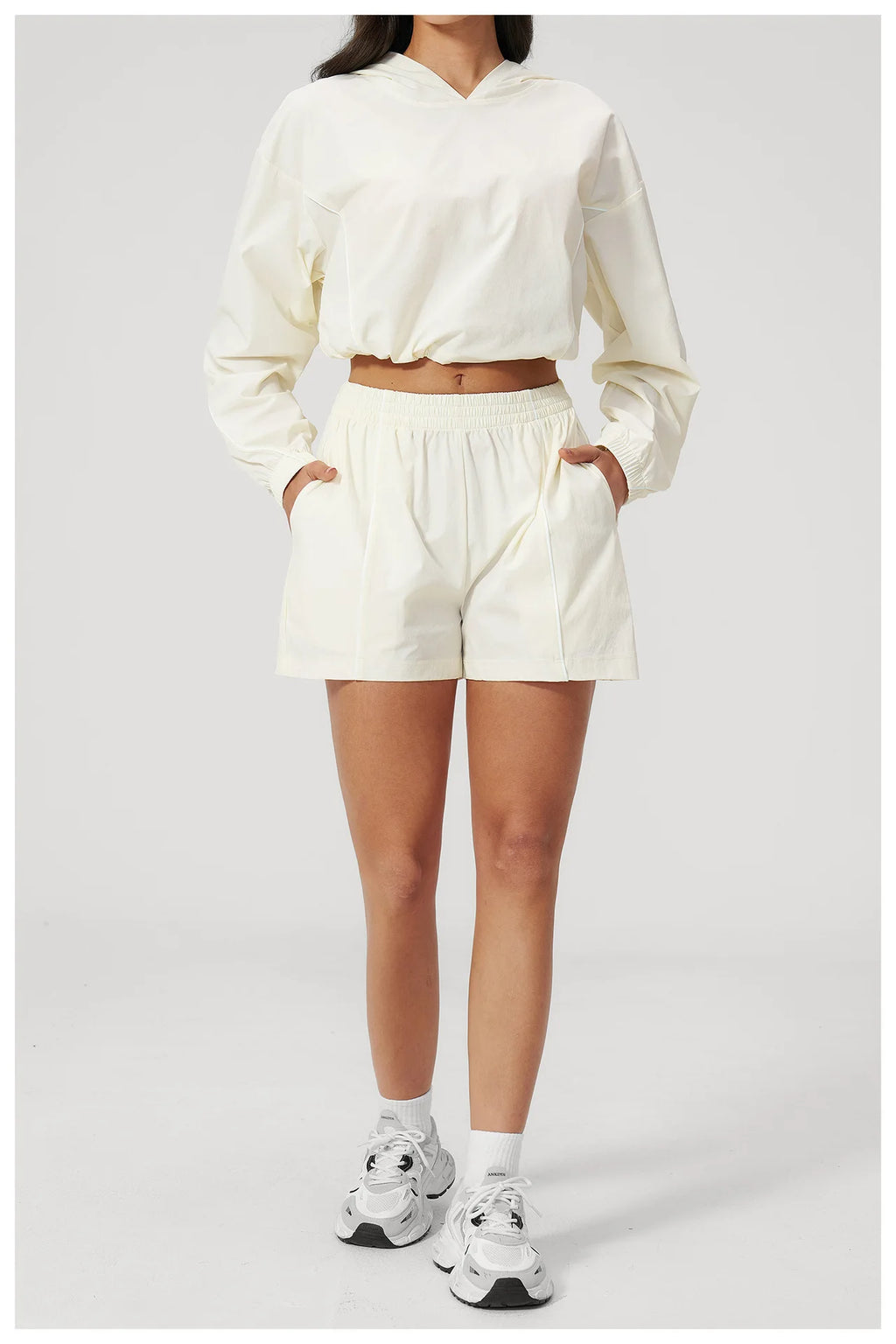 Cream hooded pullover and matching shorts set, front view, elastic waistband