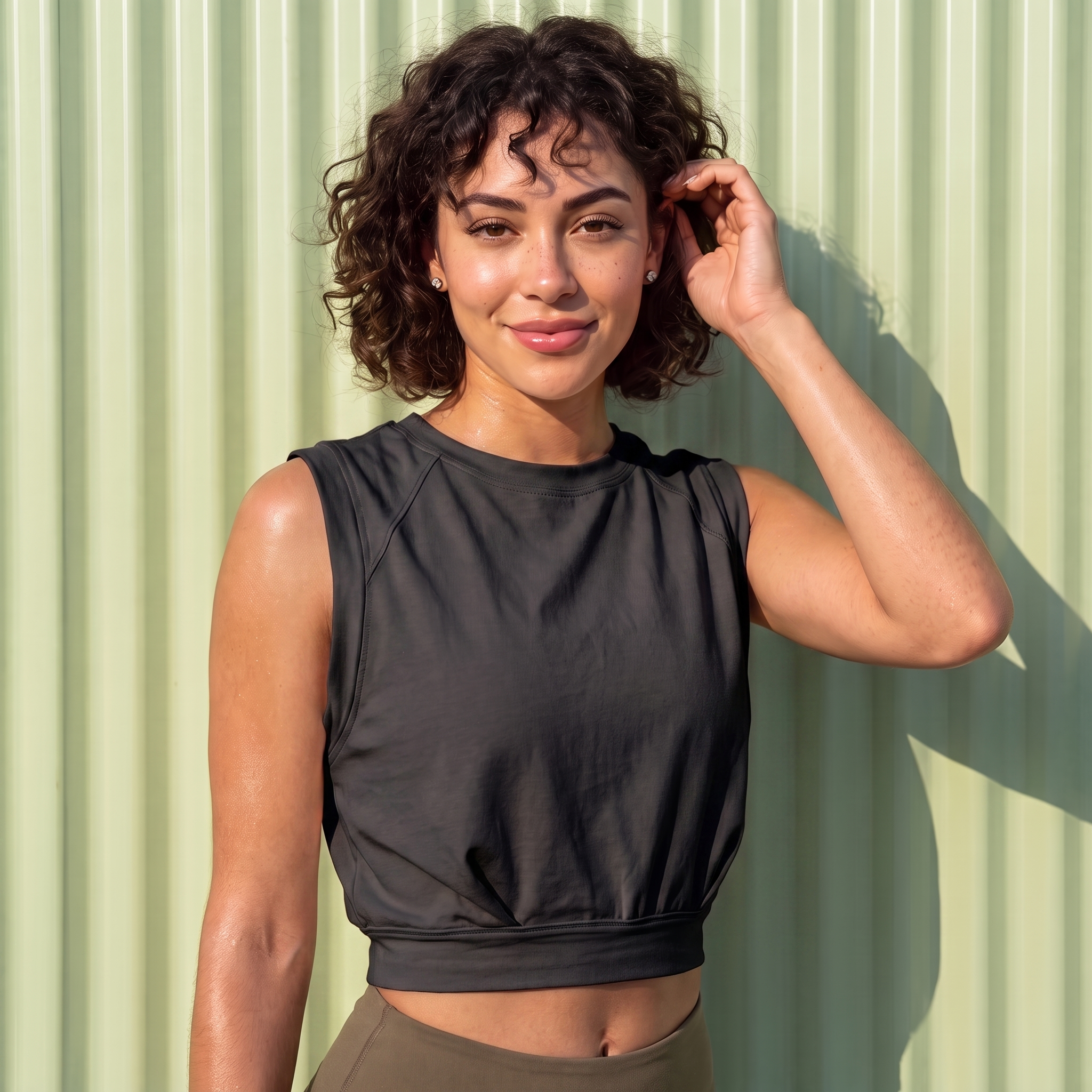 Xooie Fit baggy crop top in black featuring a relaxed fit and stylish design for casual wear.