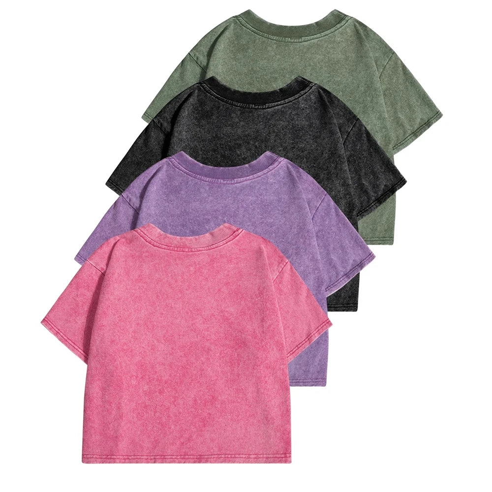 Assorted acid-wash crop boxy T-shirts in green, purple, pink, and black
