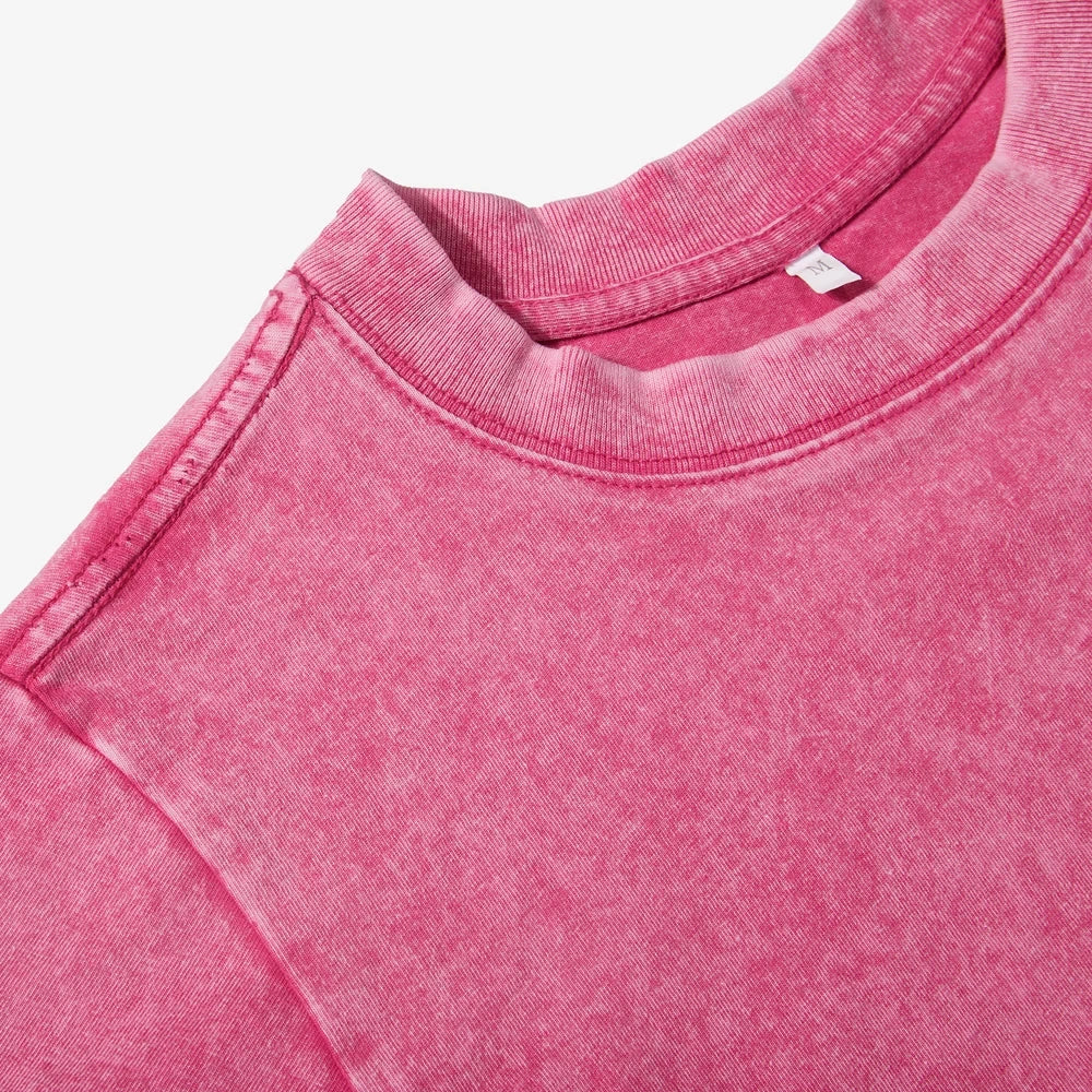 Acid wash crop top tee with ribbed crew neck, pink short sleeve hem detail