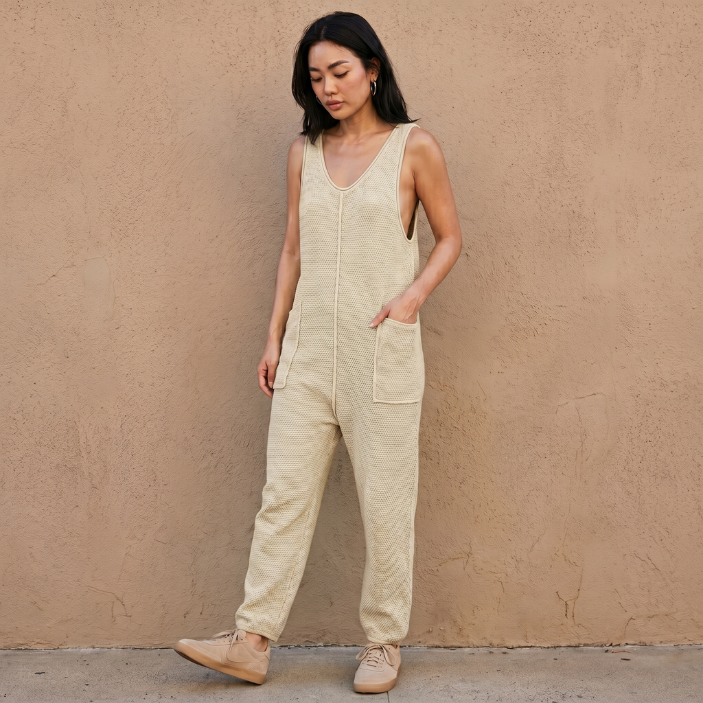 Light ivory knit sleeveless wide-leg pocket jumpsuit with scoop neckline
