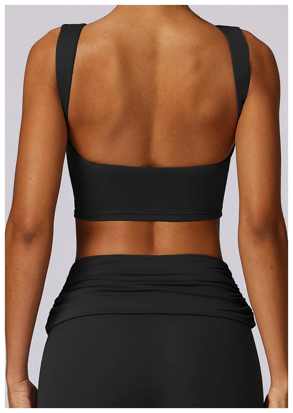 Black racerback sports bra crop top, open back detail
