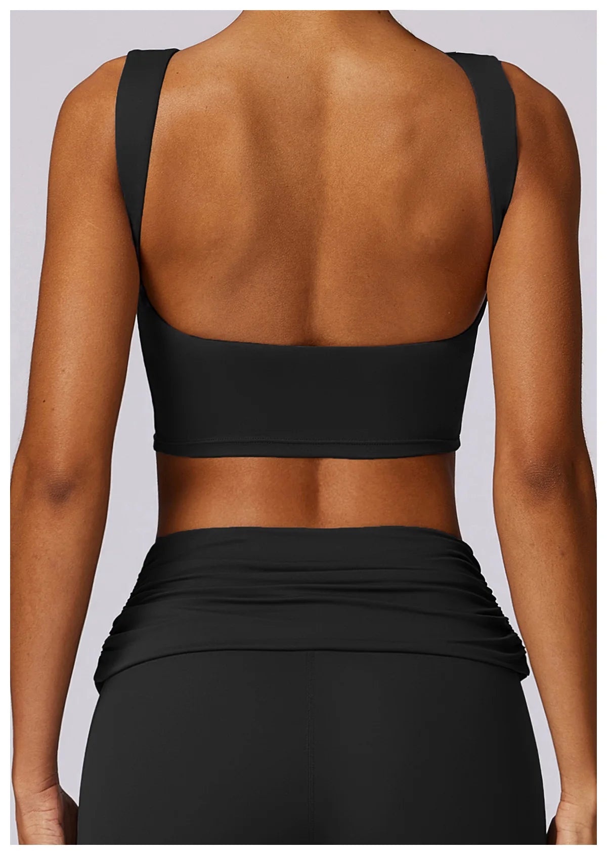 Black racerback sports bra crop top, open back detail