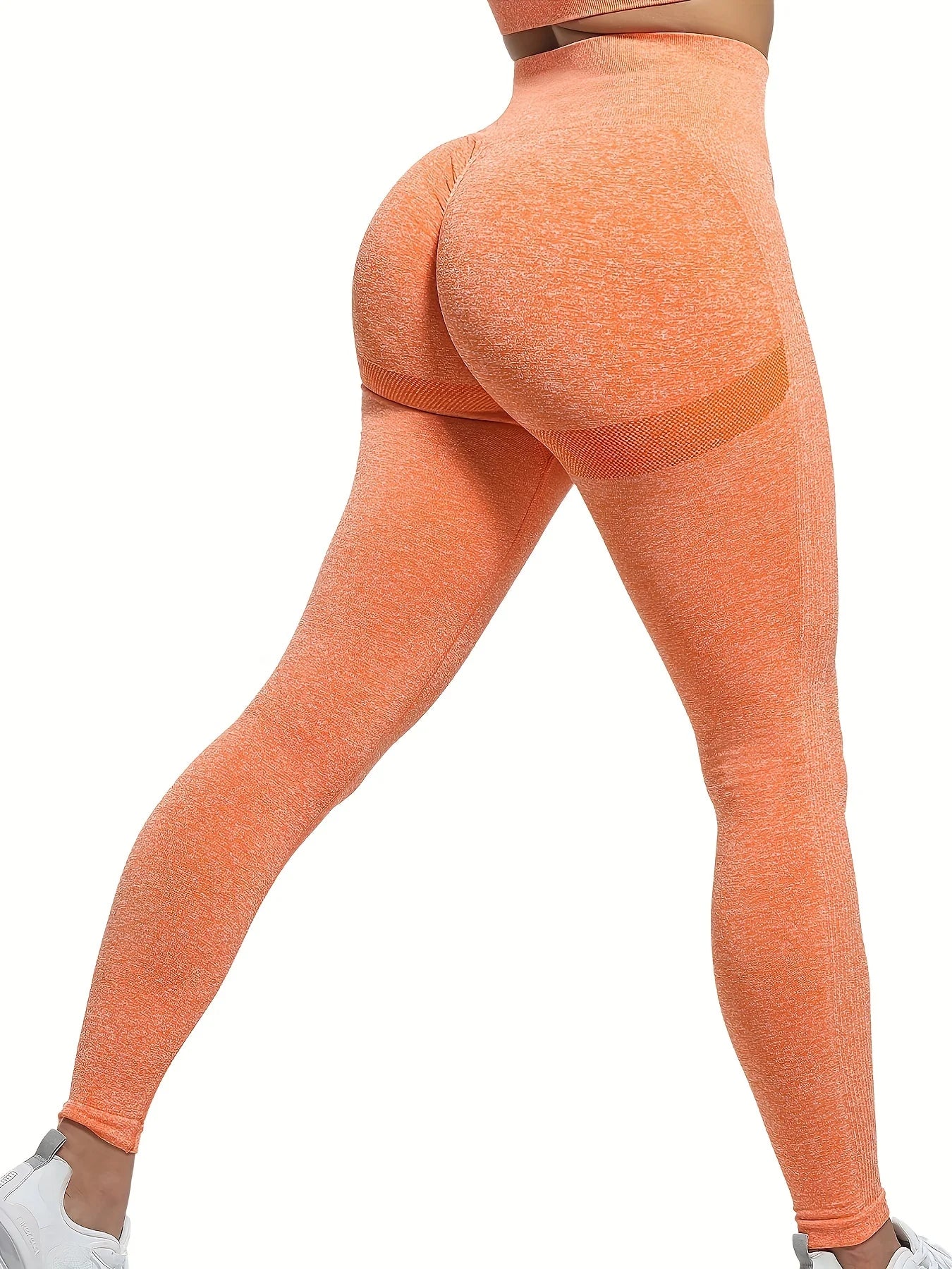 Xooie Fit Booty Sculpting Leggings in vibrant orange for enhanced curves and comfort during workouts