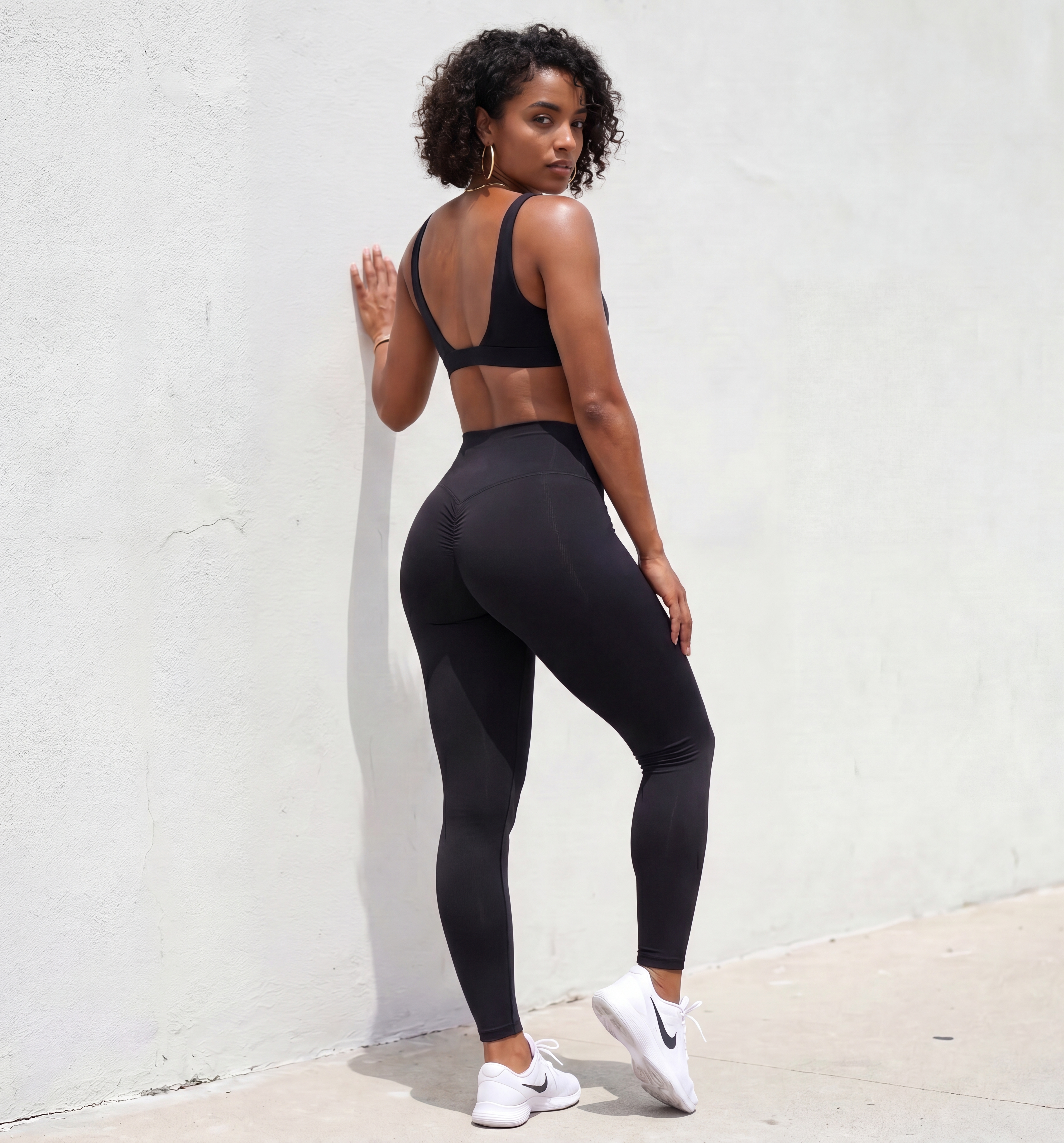 Xooie Fit Black Bra and Leggings Set featuring a stylish back design for activewear enthusiasts