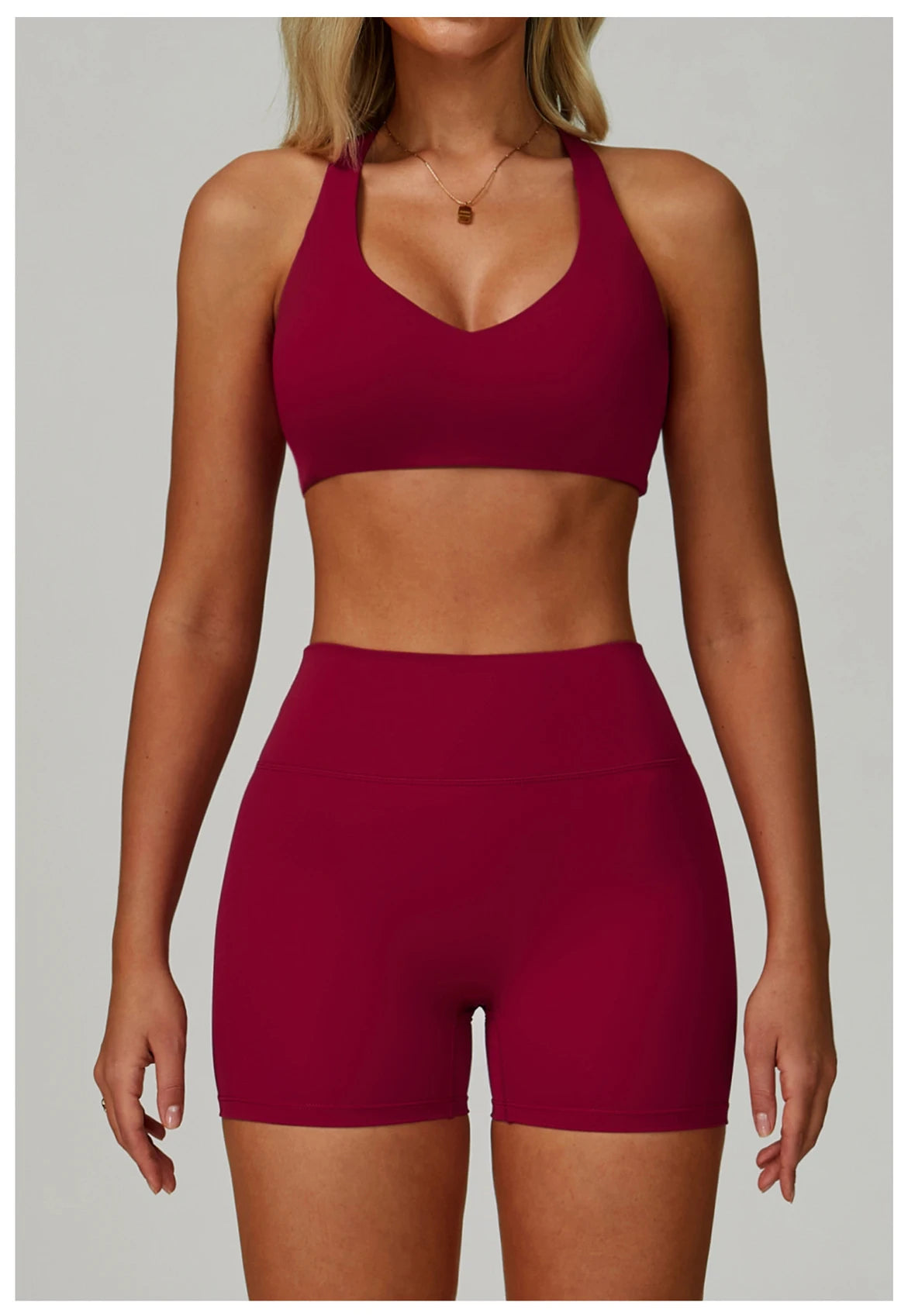 Rose red sports bralette and high-waisted active shorts matching set