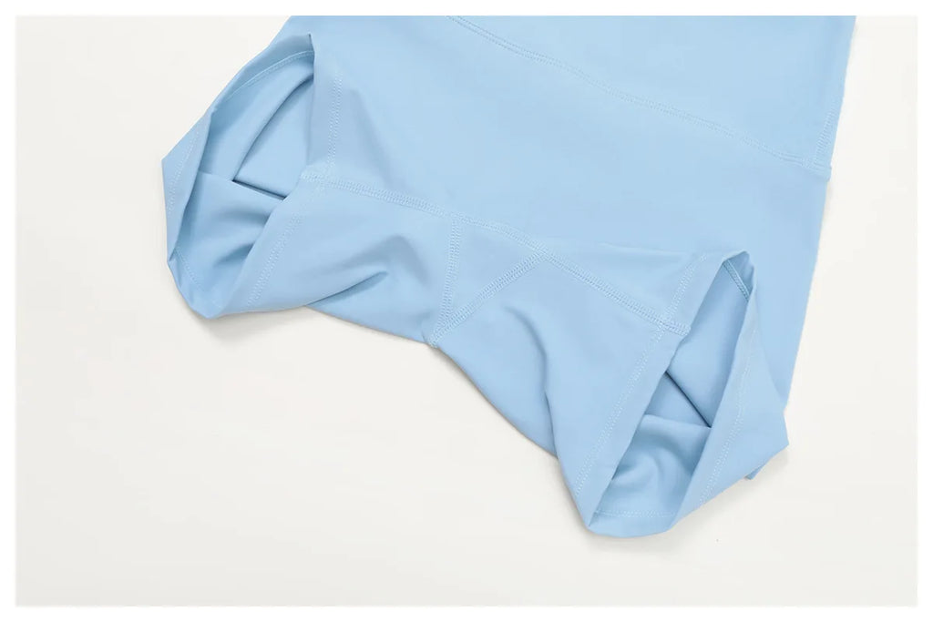 Crystal Blue high-waisted shorts leg and side seam, close-up