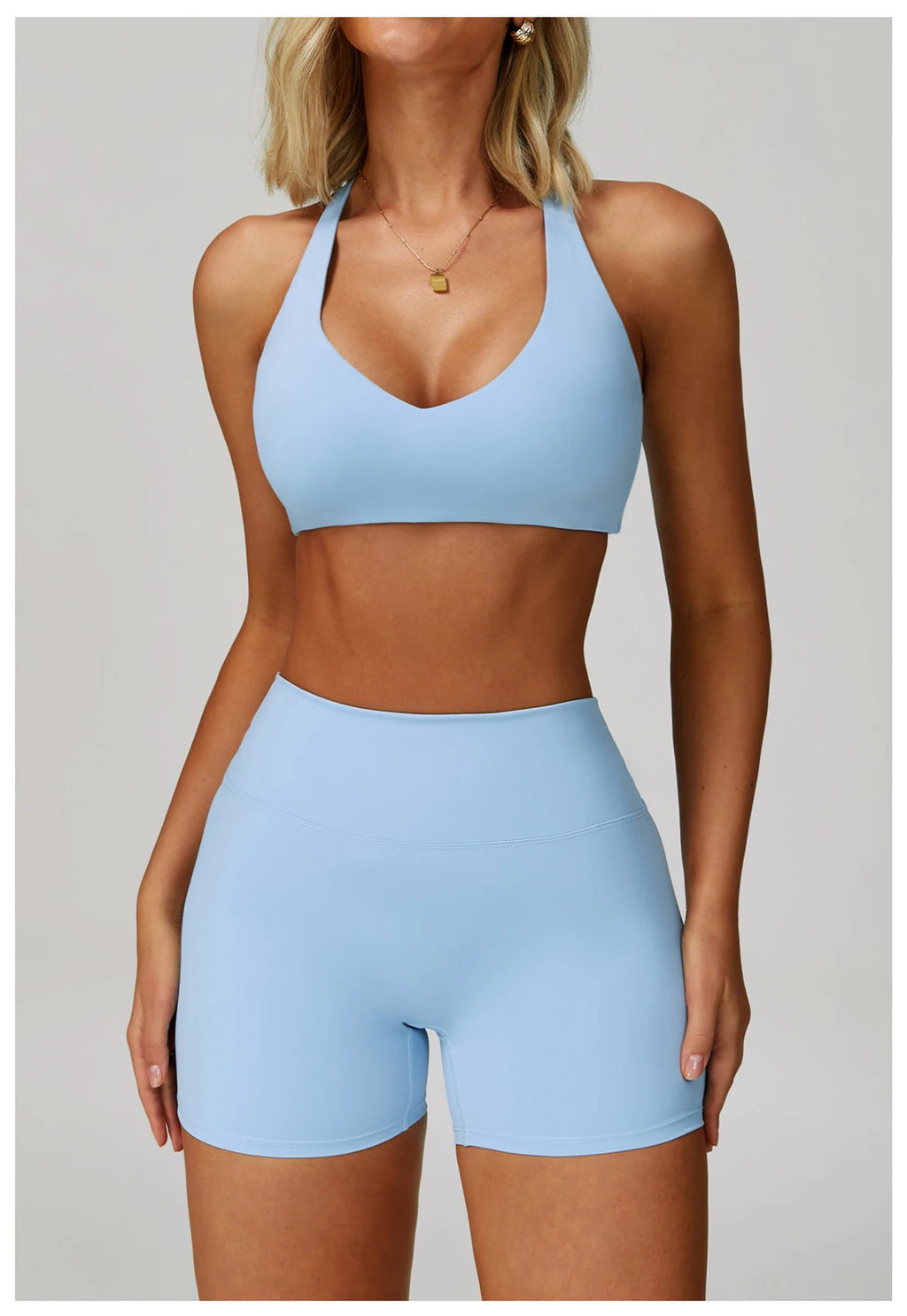 Crystal blue sports bralette and high-waisted active shorts matching set