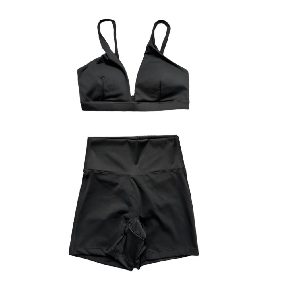 Black matching set: triangle bralette and high-waisted shorts.