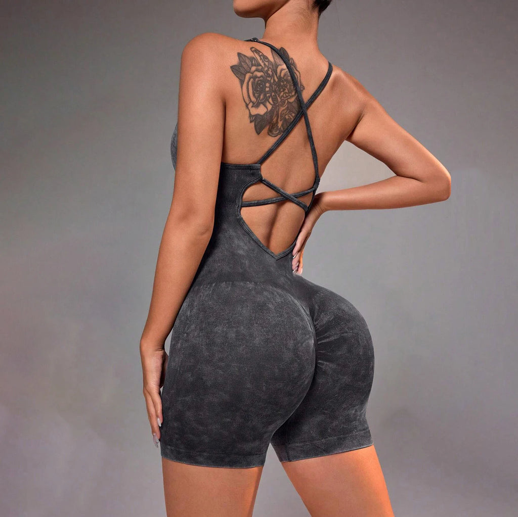 Distressed washed yoga bodysuit with strappy open-back one-piece short, dark gray