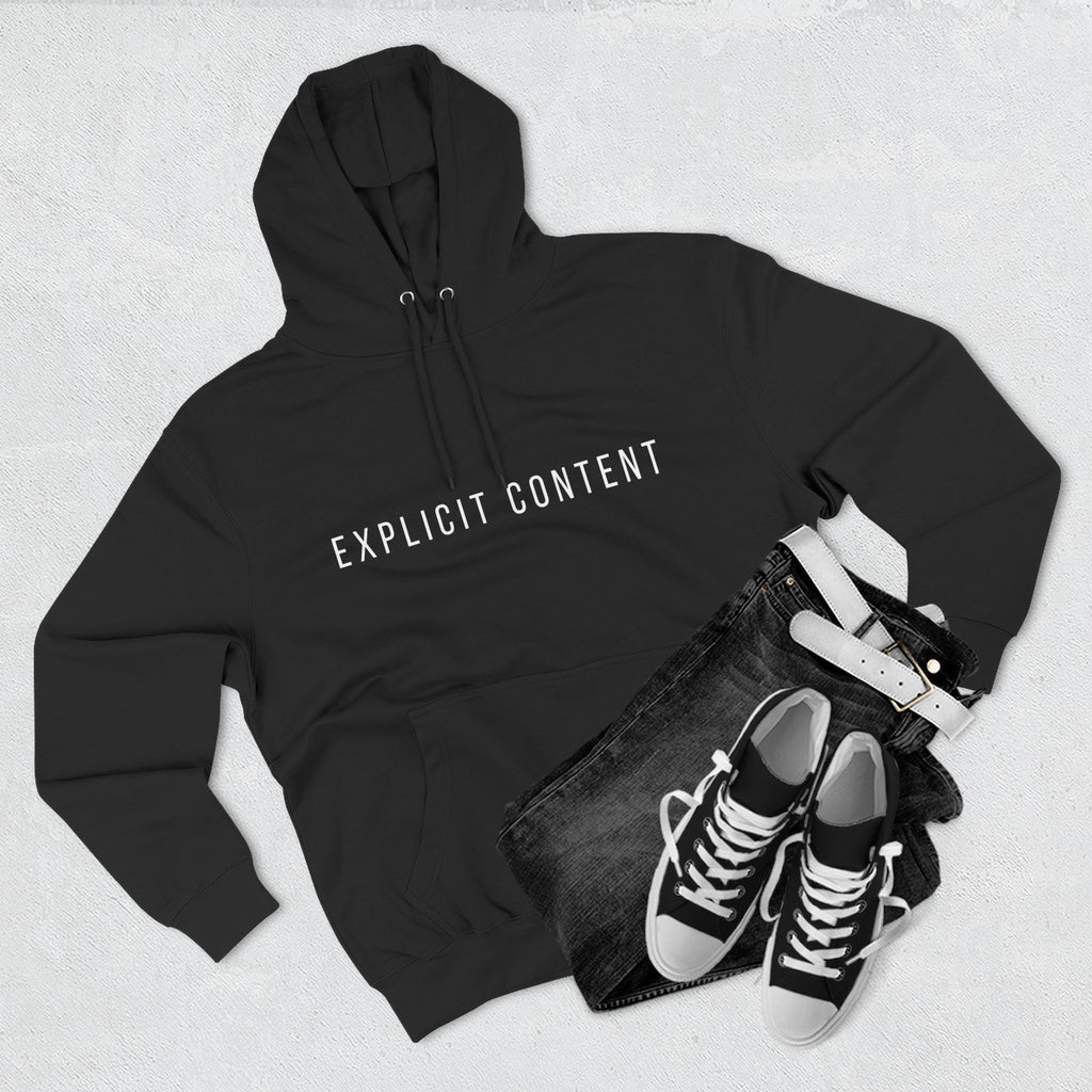 Black pullover hoodie with “EXPLICIT CONTENT” chest print; hood and drawstring shown
